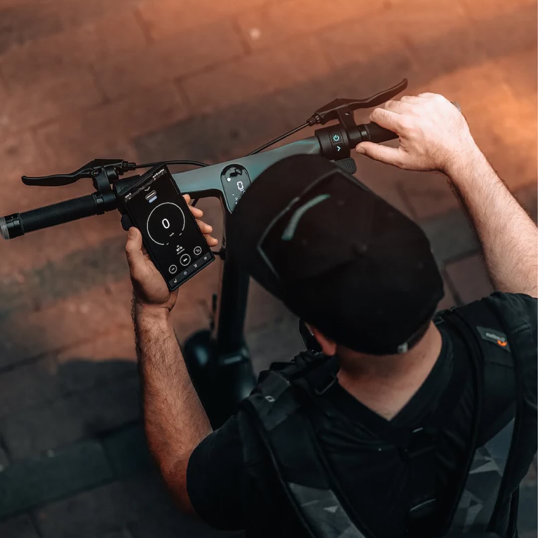 Person looking at phone with Apollo App open