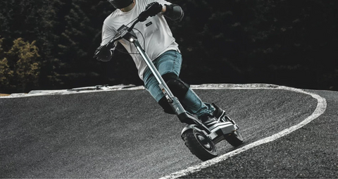 Person Riding an Apollo Pro on a race track