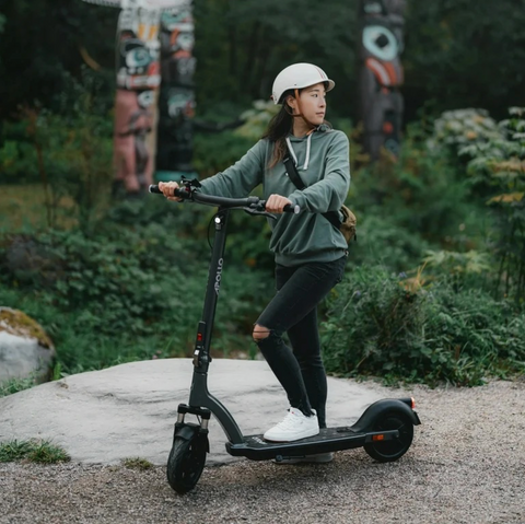 Woman riding an Apollo Air 2023